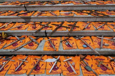 Victoria, BC Canada - October 16, 2021:  Every Child Matters Orange Shirts on British Columbia Legislature Building Steps, Symbol of Canada National Day for Truth and Reconciliation